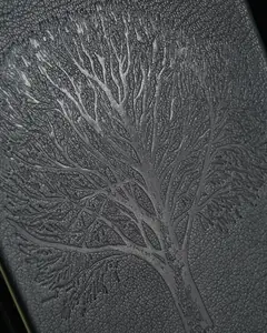 The tree tooled into the cover